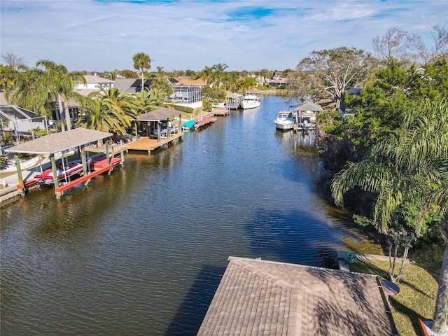 9 Cedar Hollow Ct, Palm Coast, FL 32137 - view of dock featuring a water view, boat lift, and a residential view