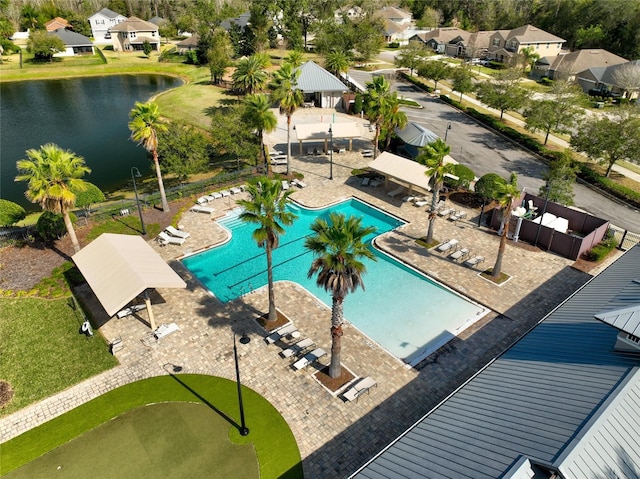 exterior space with a water view and a residential view