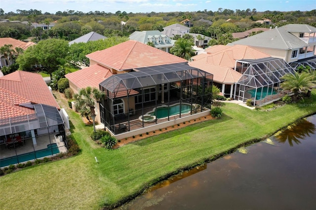 aerial view featuring a water view and a residential view