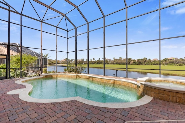 view of pool featuring a pool with connected hot tub, a water view, a lanai, and a patio