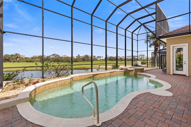 view of pool featuring a pool with connected hot tub, a water view, a lanai, and a patio