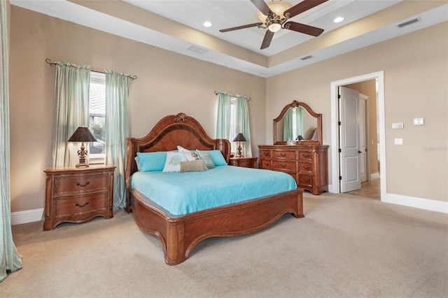 bedroom featuring recessed lighting, baseboards, light colored carpet, and visible vents