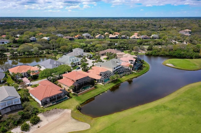 birds eye view of property with a residential view and a water view