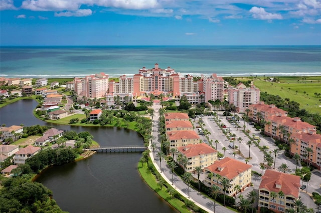 bird's eye view featuring a city view and a water view