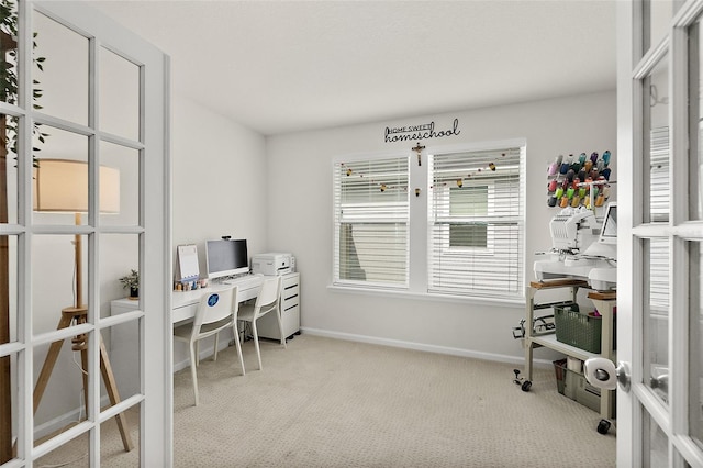 office with baseboards and carpet flooring