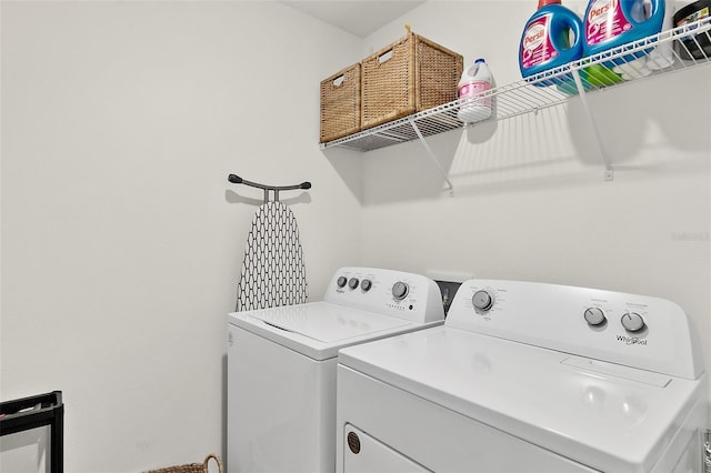 laundry room featuring laundry area and washing machine and dryer