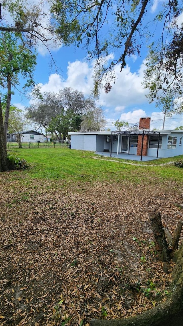 view of yard with fence