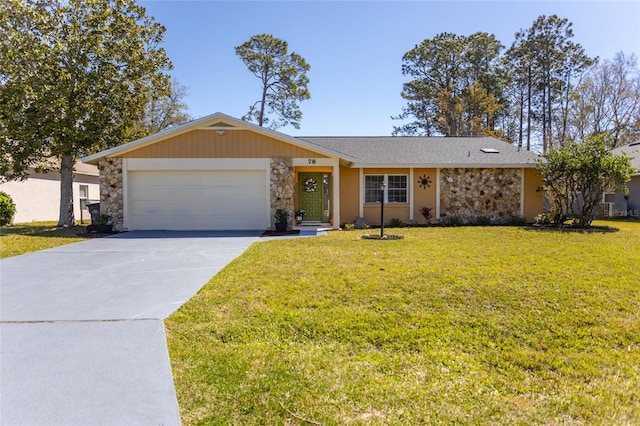 ranch-style house featuring a front lawn, an attached garage, stone siding, and driveway