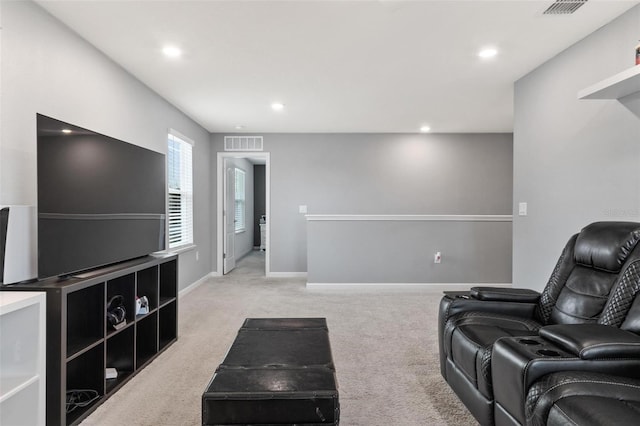 sitting room with visible vents, recessed lighting, baseboards, and carpet