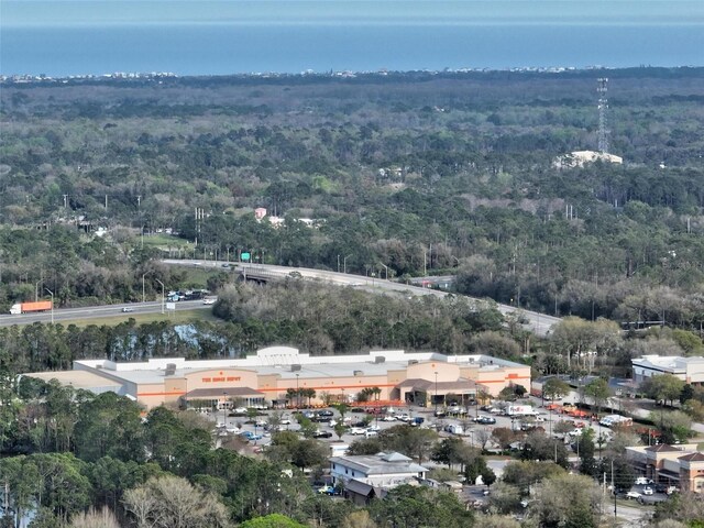 aerial view featuring a forest view