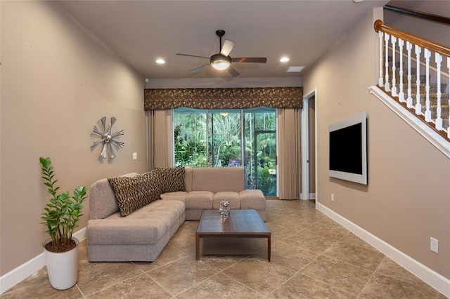 living area featuring recessed lighting, ceiling fan, stairway, and baseboards