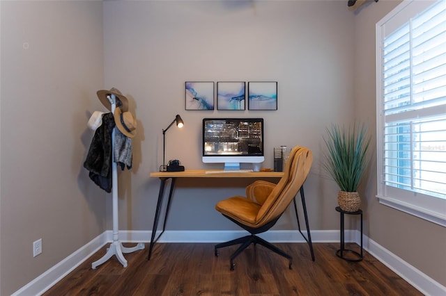 office area with wood finished floors and baseboards