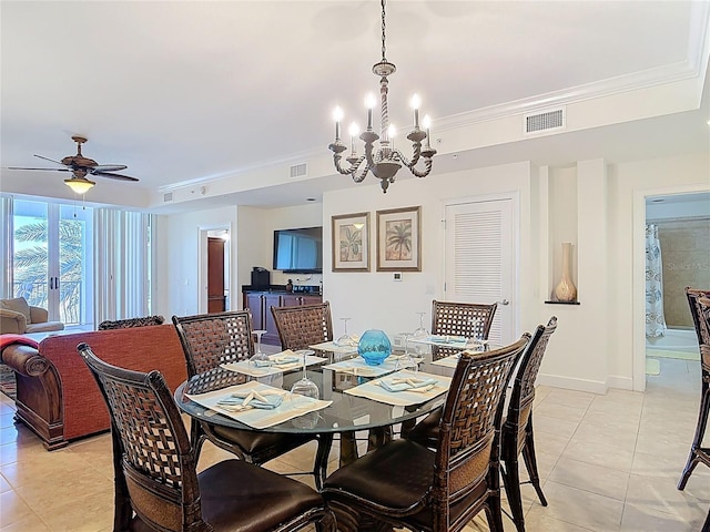 dining space featuring visible vents, ceiling fan with notable chandelier, crown molding, light tile patterned floors, and baseboards