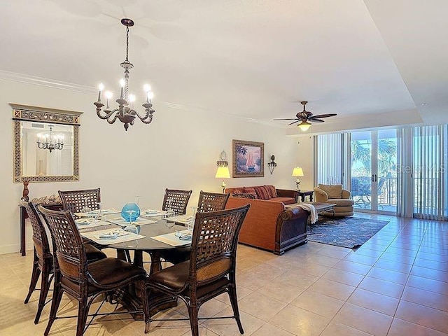 dining room with crown molding, light tile patterned floors, ceiling fan with notable chandelier, and baseboards