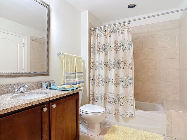 bathroom featuring tile patterned flooring, vanity, toilet, and shower / bathtub combination with curtain