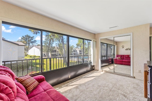 sunroom featuring visible vents