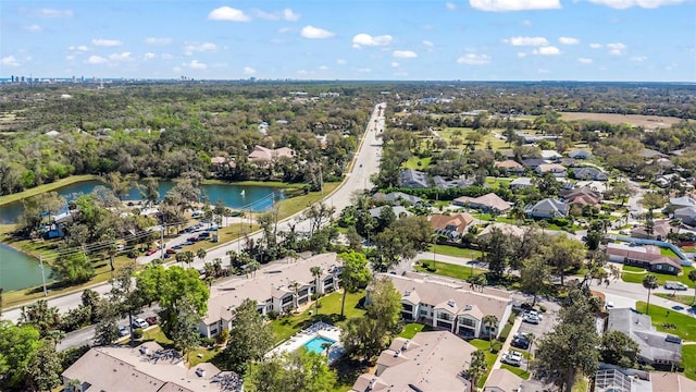 aerial view with a residential view and a water view