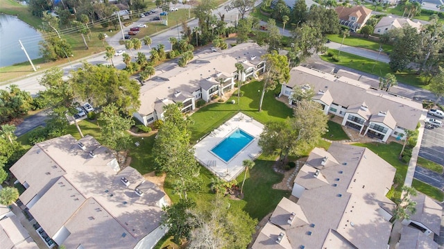 birds eye view of property with a residential view