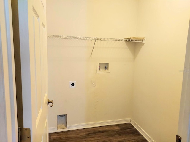 washroom with baseboards, laundry area, electric dryer hookup, washer hookup, and dark wood-type flooring