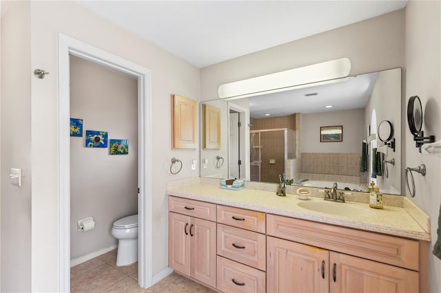 full bath with tile patterned flooring, a shower stall, baseboards, toilet, and vanity