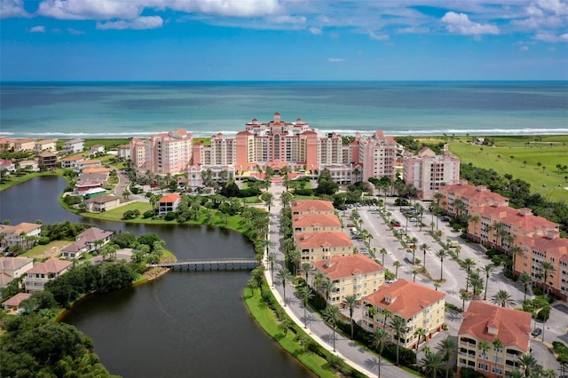 bird's eye view featuring a water view and a view of city