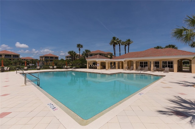 pool with a patio