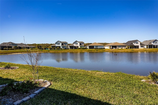 view of water feature with a residential view