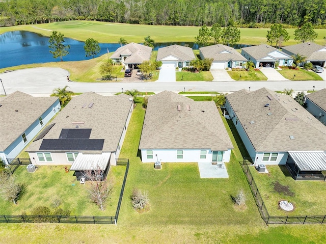 aerial view with a residential view and a water view