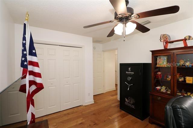 office featuring visible vents and wood finished floors