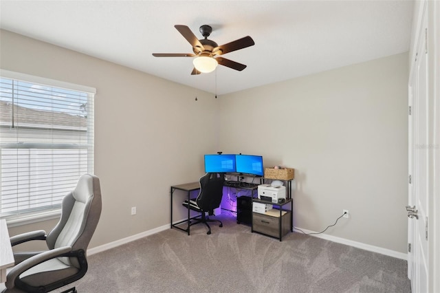 office with carpet flooring, ceiling fan, and baseboards