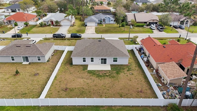 drone / aerial view with a residential view