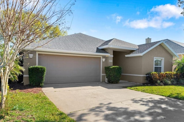 ranch-style house featuring roof with shingles, a garage, driveway, and stucco siding