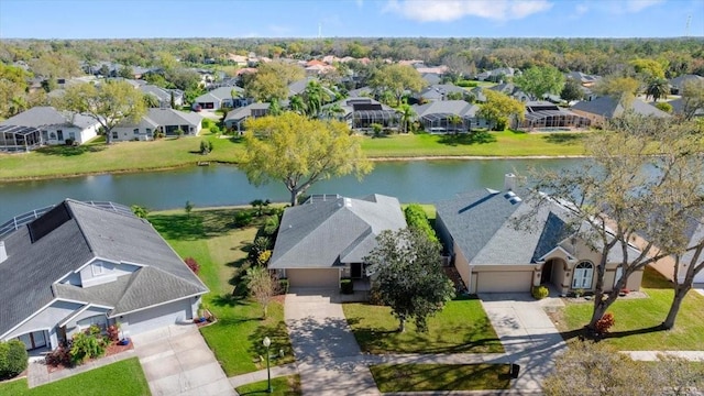 aerial view with a residential view and a water view