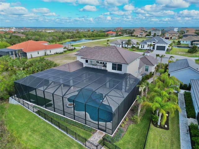 birds eye view of property with a residential view