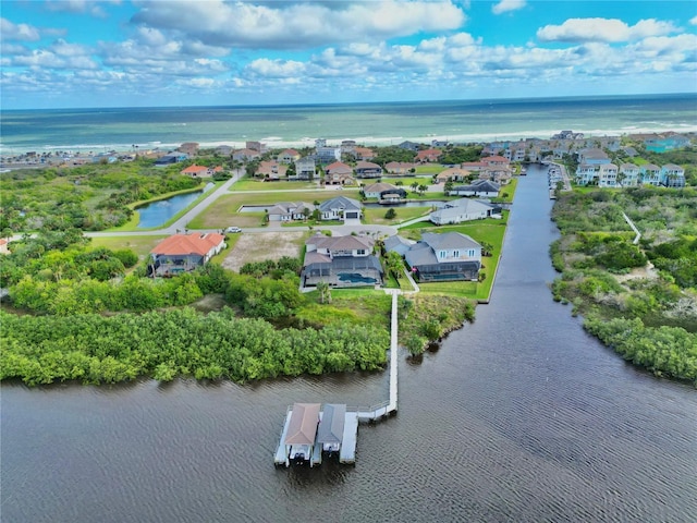 aerial view with a residential view and a water view