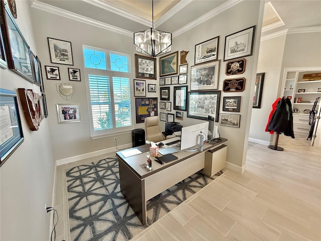 office space with crown molding, light wood-style flooring, a notable chandelier, and baseboards