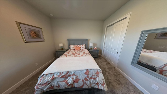 bedroom featuring a closet, baseboards, and dark carpet