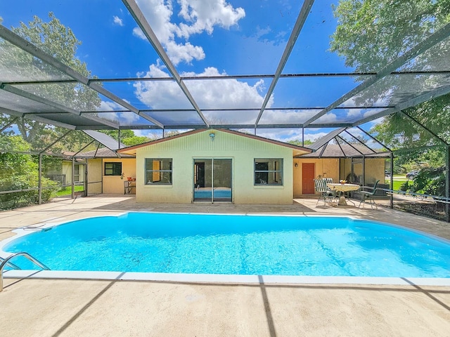 83 Farragut Dr, Palm Coast, FL 32137 - outdoor pool with a patio area and glass enclosure