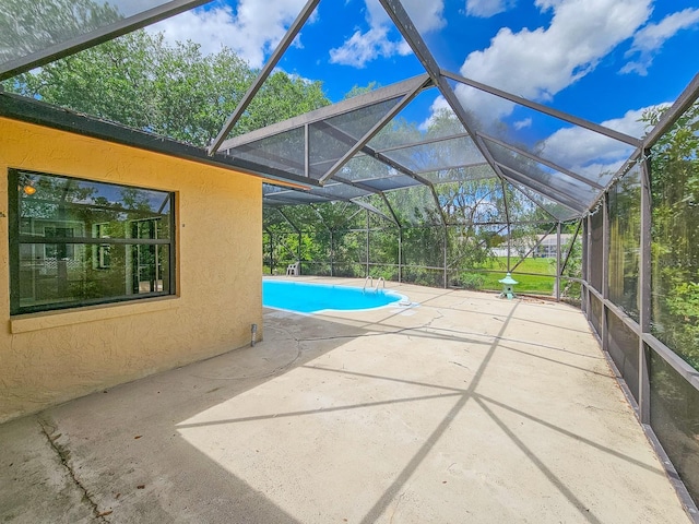 83 Farragut Dr, Palm Coast, FL 32137 - outdoor pool featuring a patio and glass enclosure