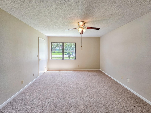 83 Farragut Dr, Palm Coast, FL 32137 - unfurnished room featuring ceiling fan, carpet flooring, and a textured ceiling