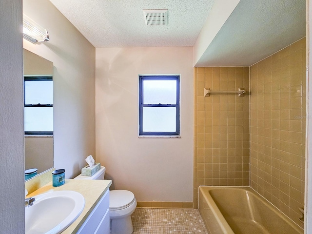 83 Farragut Dr, Palm Coast, FL 32137 - bathroom with tile patterned flooring, vanity, a textured ceiling, and shower / bath combination
