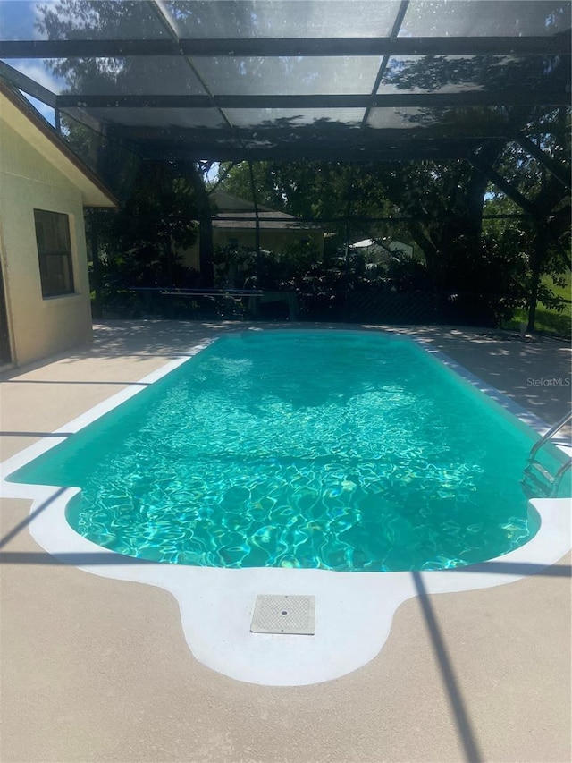 83 Farragut Dr, Palm Coast, FL 32137 - outdoor pool with a patio and a lanai