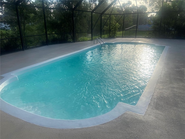 83 Farragut Dr, Palm Coast, FL 32137 - outdoor pool with a lanai and a patio