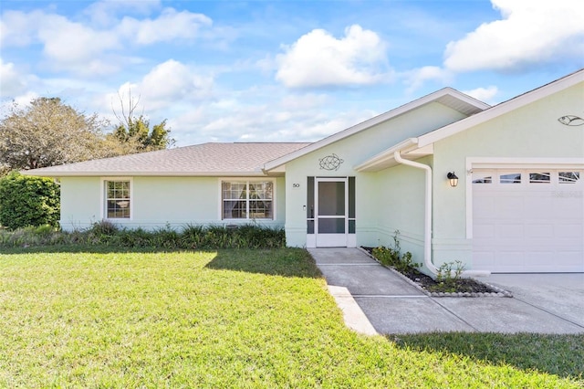 ranch-style home with stucco siding, a garage, and a front lawn