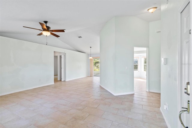 spare room featuring baseboards, light tile patterned floors, high vaulted ceiling, and ceiling fan