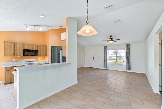 kitchen with electric range, visible vents, black microwave, light countertops, and lofted ceiling