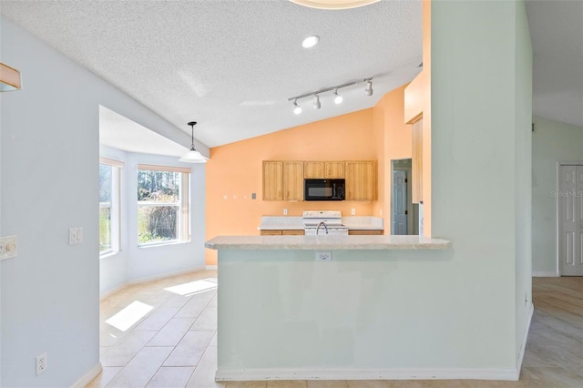 kitchen featuring black microwave, light countertops, lofted ceiling, range with electric stovetop, and a textured ceiling