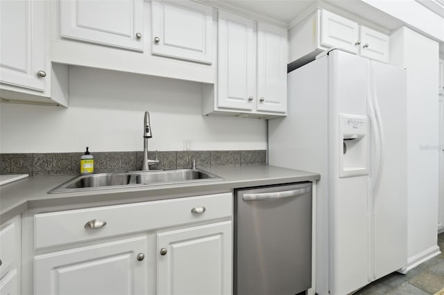 2970 Saint Johns Ave Unit 3F, Jacksonville, FL 32205 - kitchen with a sink, stainless steel dishwasher, white fridge with ice dispenser, and white cabinetry