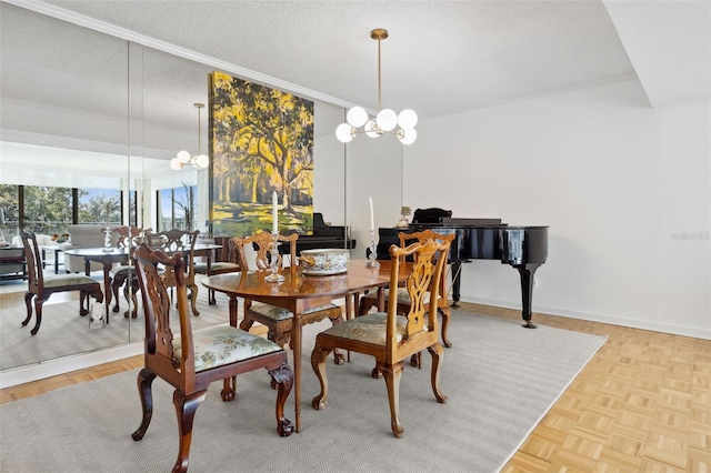 2970 Saint Johns Ave Unit 3F, Jacksonville, FL 32205 - dining room featuring a chandelier, a textured ceiling, and baseboards