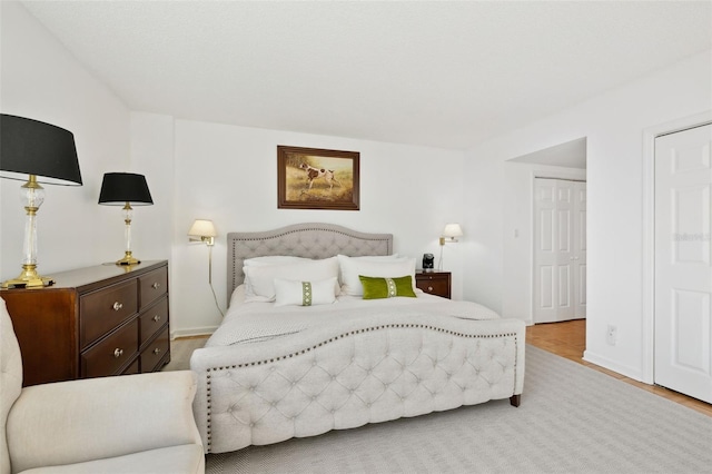 2970 Saint Johns Ave Unit 3F, Jacksonville, FL 32205 - bedroom with baseboards and wood finished floors